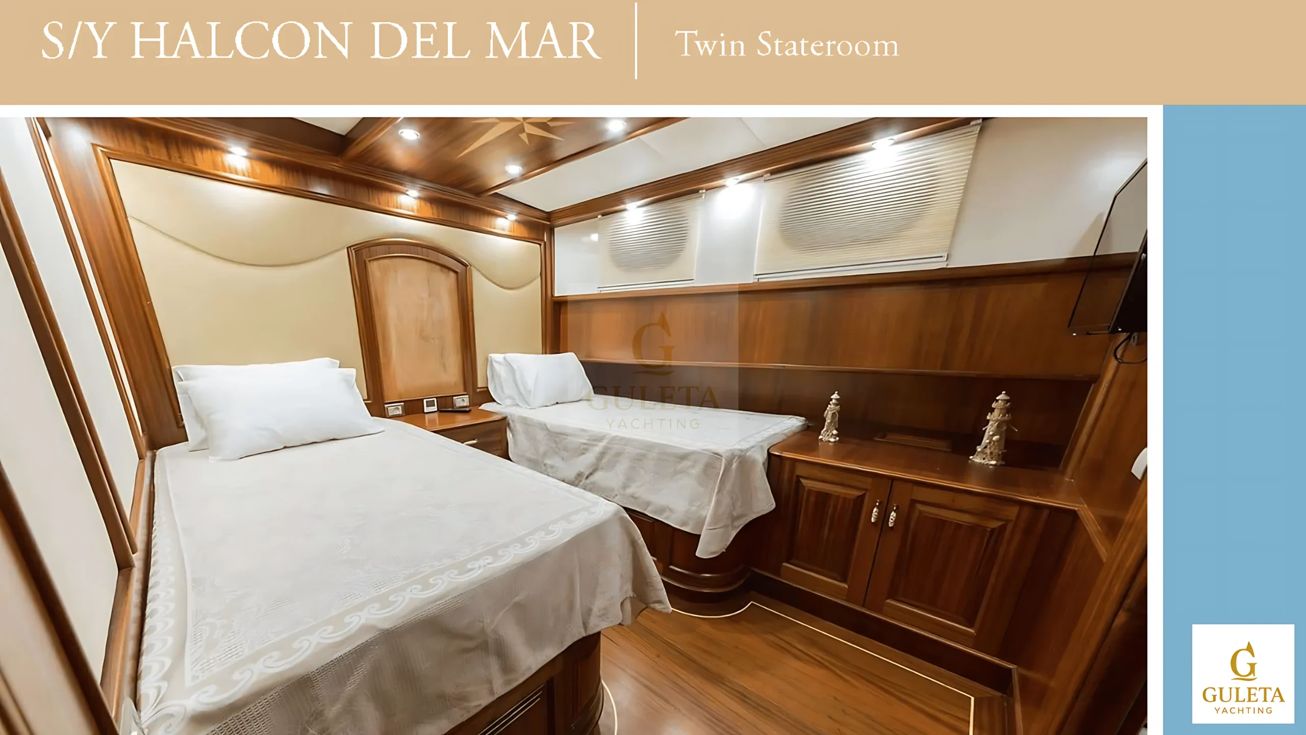 Twin cabin aboard Halcon Del Mar, furnished with two single beds and decorated for a peaceful night's rest.