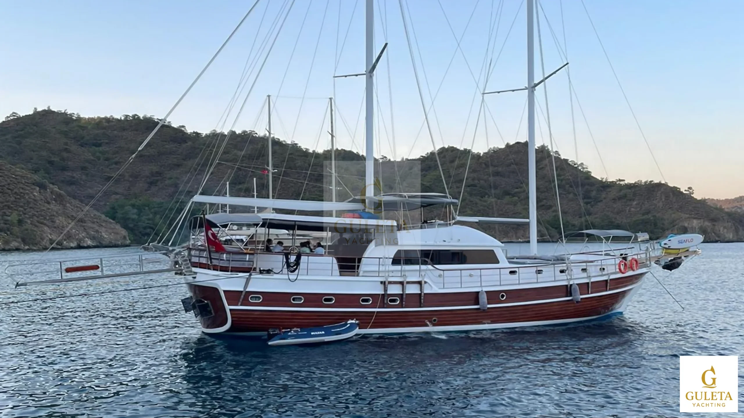 Full exterior view of Sulyar Gulet cruising on the Aegean Sea, displaying her elegant profile and deluxe structure.
