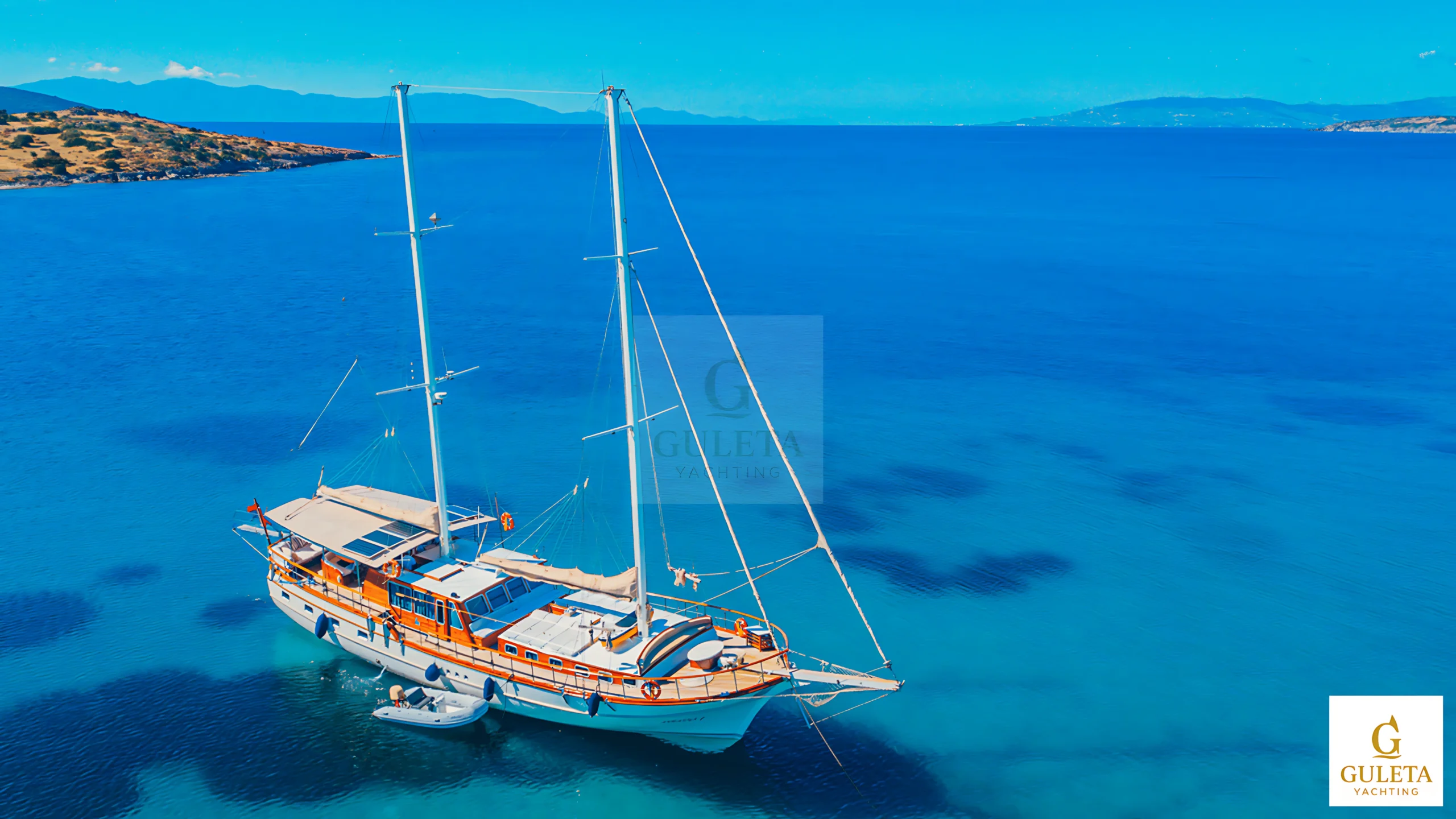 Exterior view of Avrasya Gulet showcasing her elegant design and traditional wooden hull.