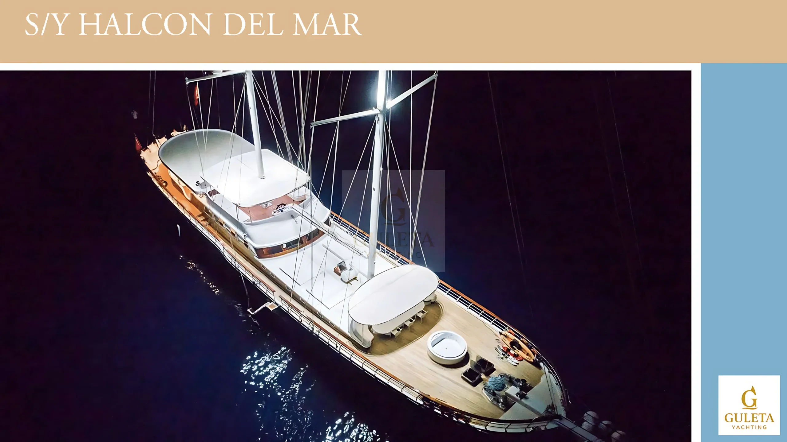 Halcon Del Mar gulet illuminated at night, highlighting her elegant silhouette and warm ambient lighting.