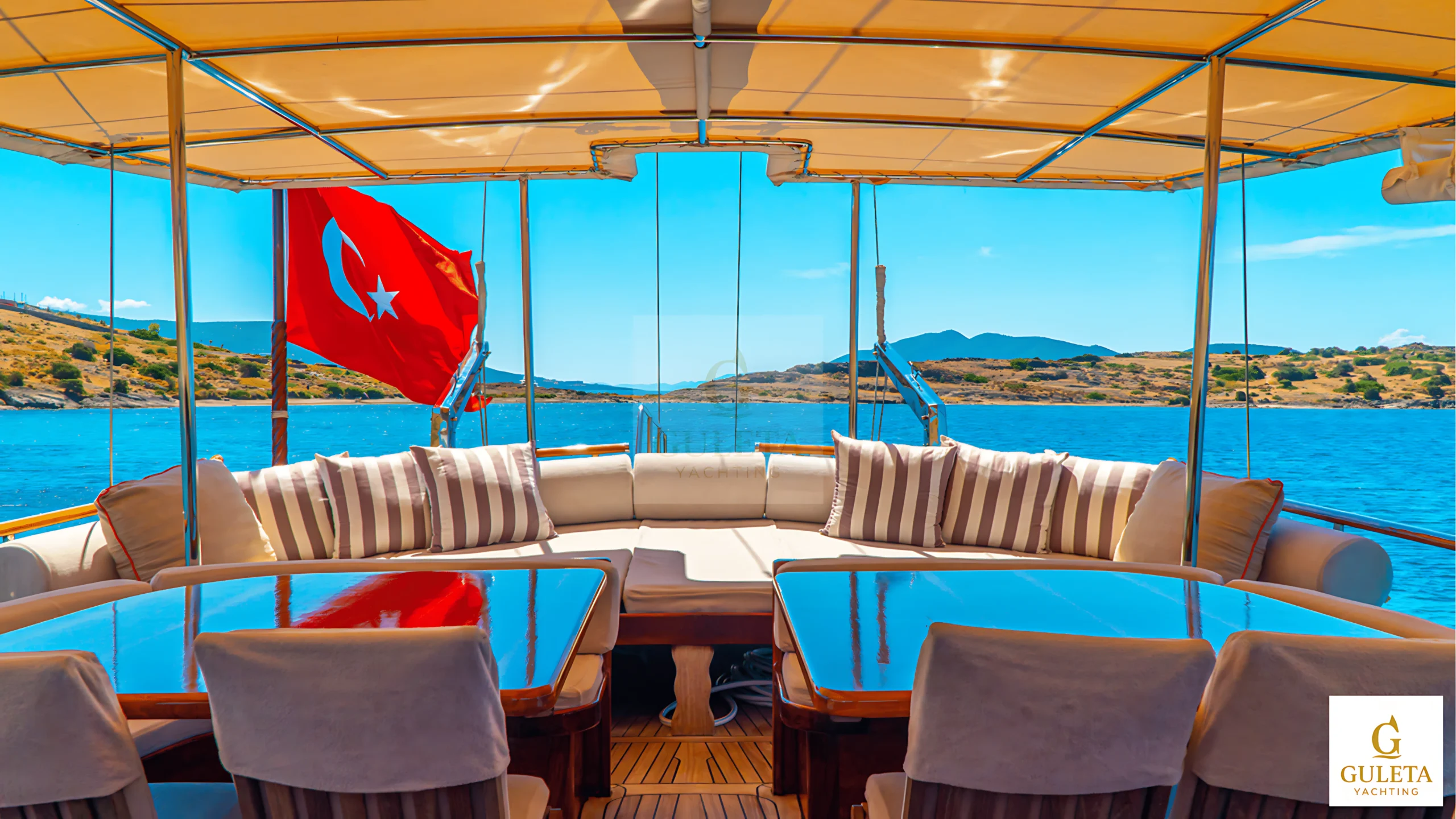 Guleta Yachting gold emblem featured on Avrasya Gulet page, symbolizing premium yacht charter services in Turkey.