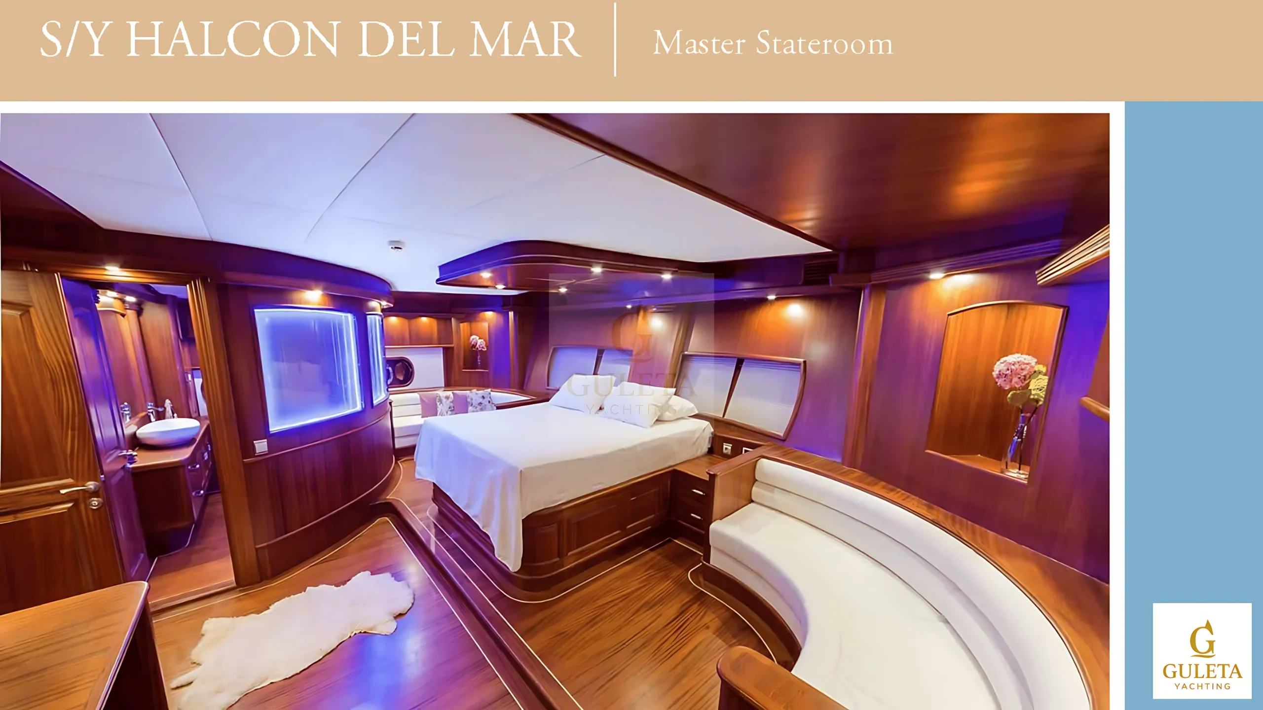 Spacious master cabin on Halcon Del Mar, featuring a large bed, premium woodwork, and cozy lighting.