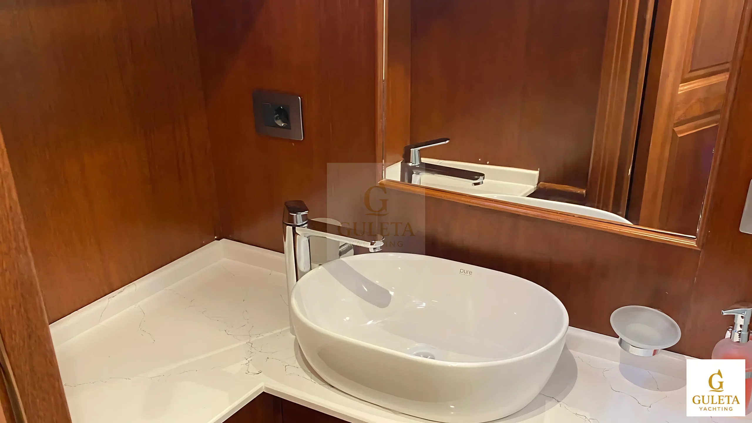 Rosa Del Mar Gulet bathroom with modern shower, vanity, and high-end marine interior detailing.