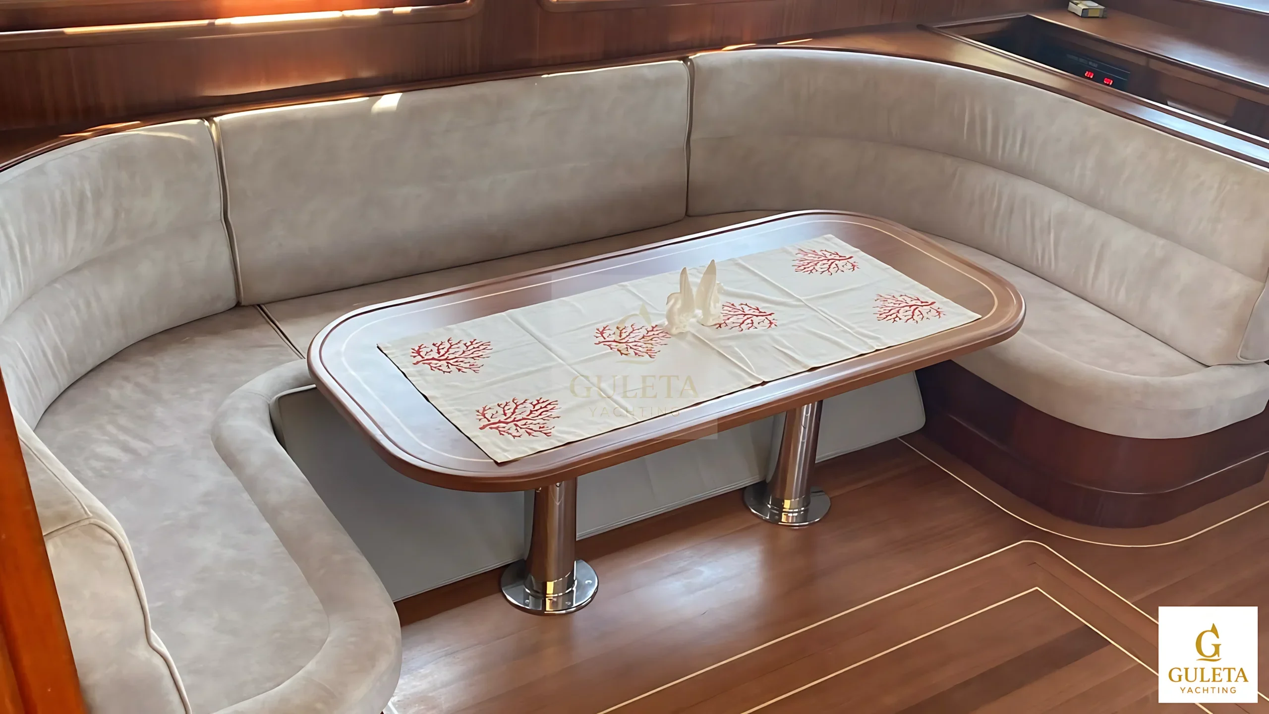 Rosa Del Mar Gulet indoor lounge with large sofa set, ideal for socializing or relaxing in comfort.