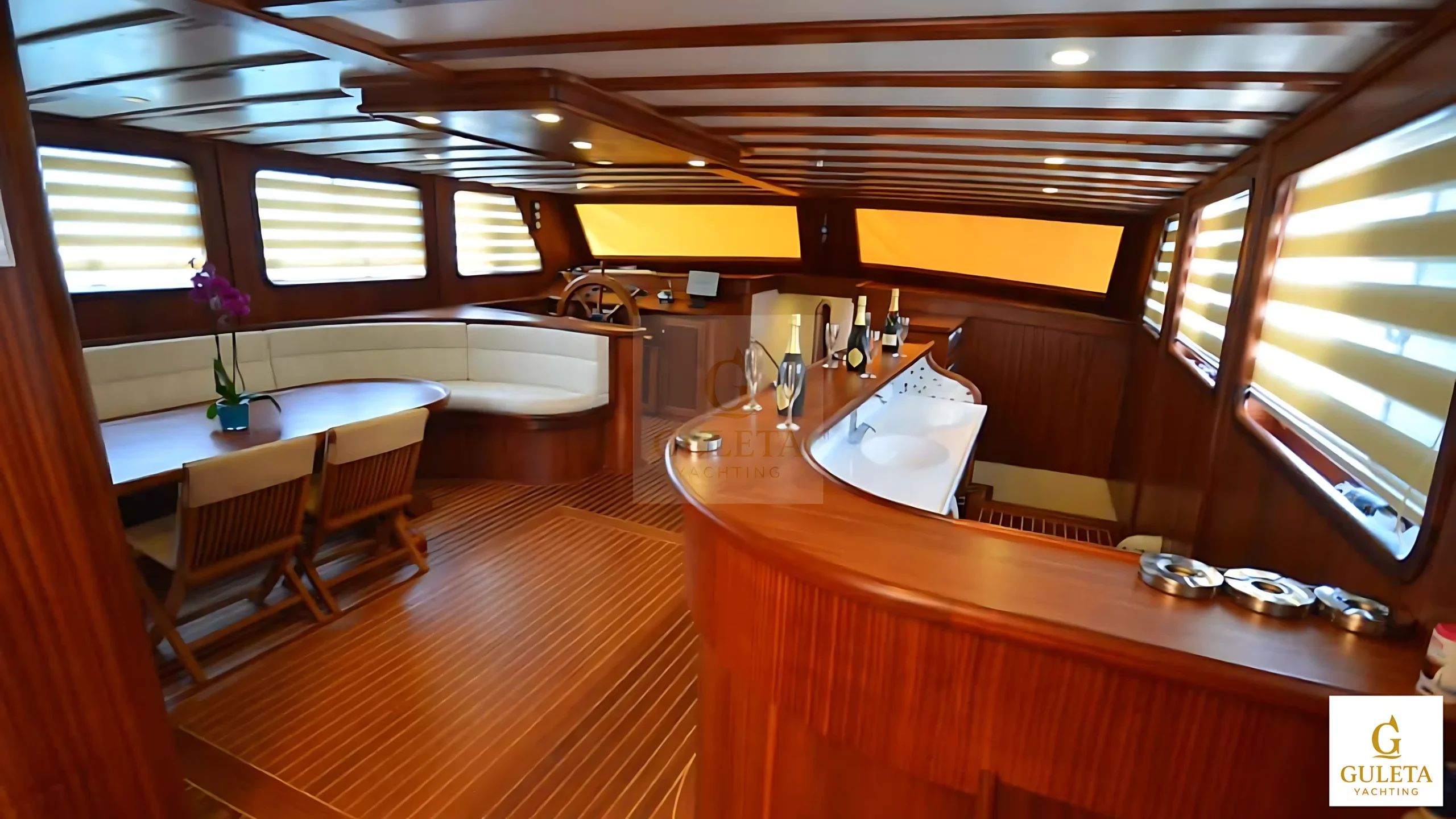Indoor bar area of the C.Taner II Gulet featuring classic wooden design.