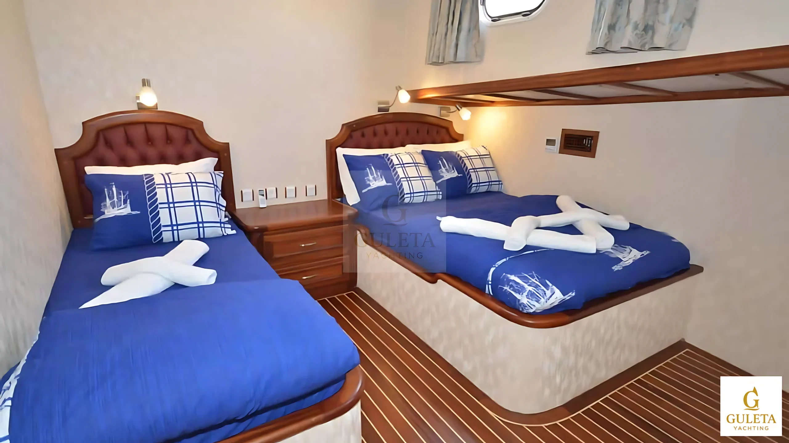 Twin cabin on the C.Taner II Gulet featuring two single beds.