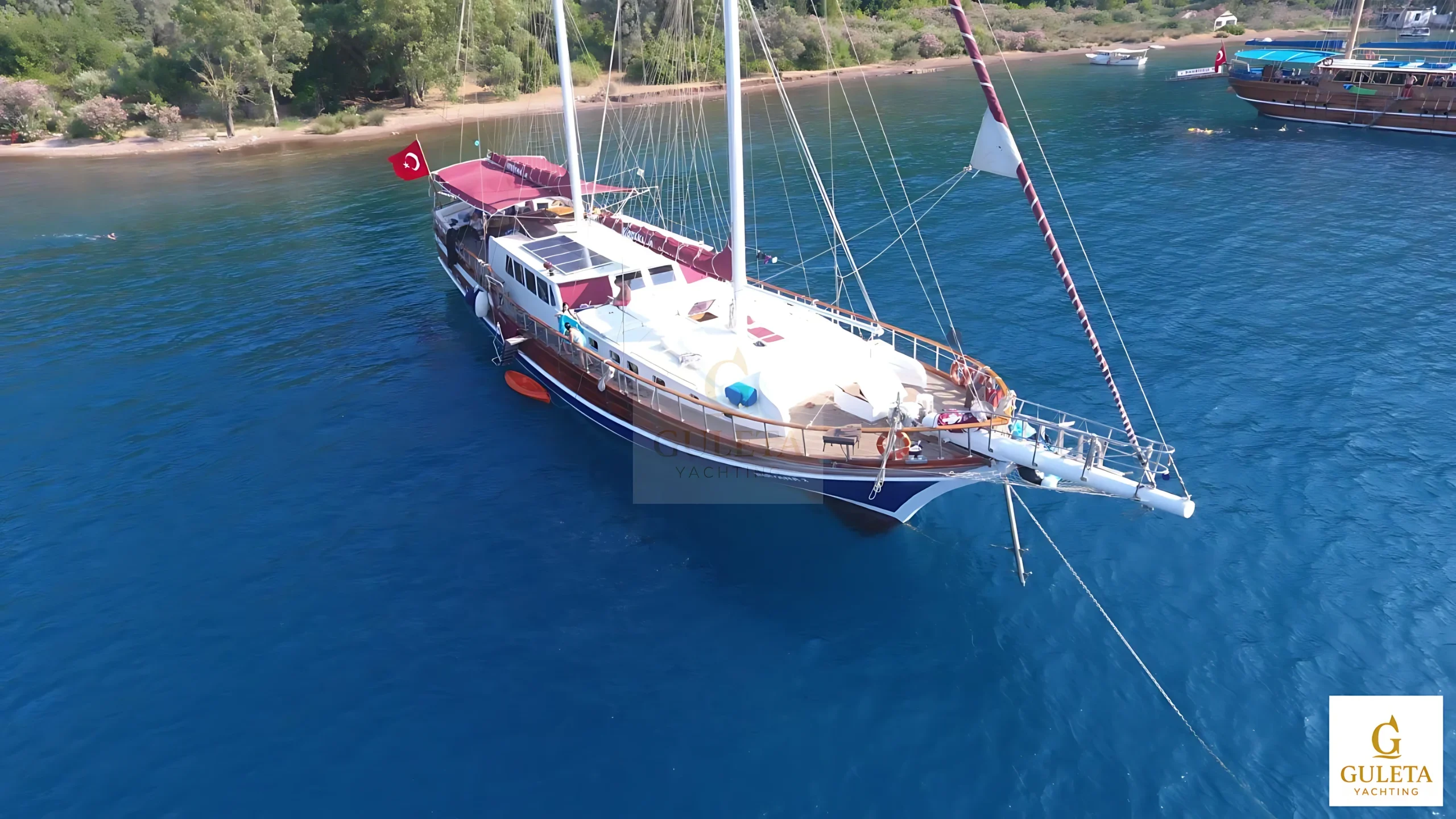 Nirvana Gulet port side aerial exterior view for private yacht rental in Bodrum, Turkey