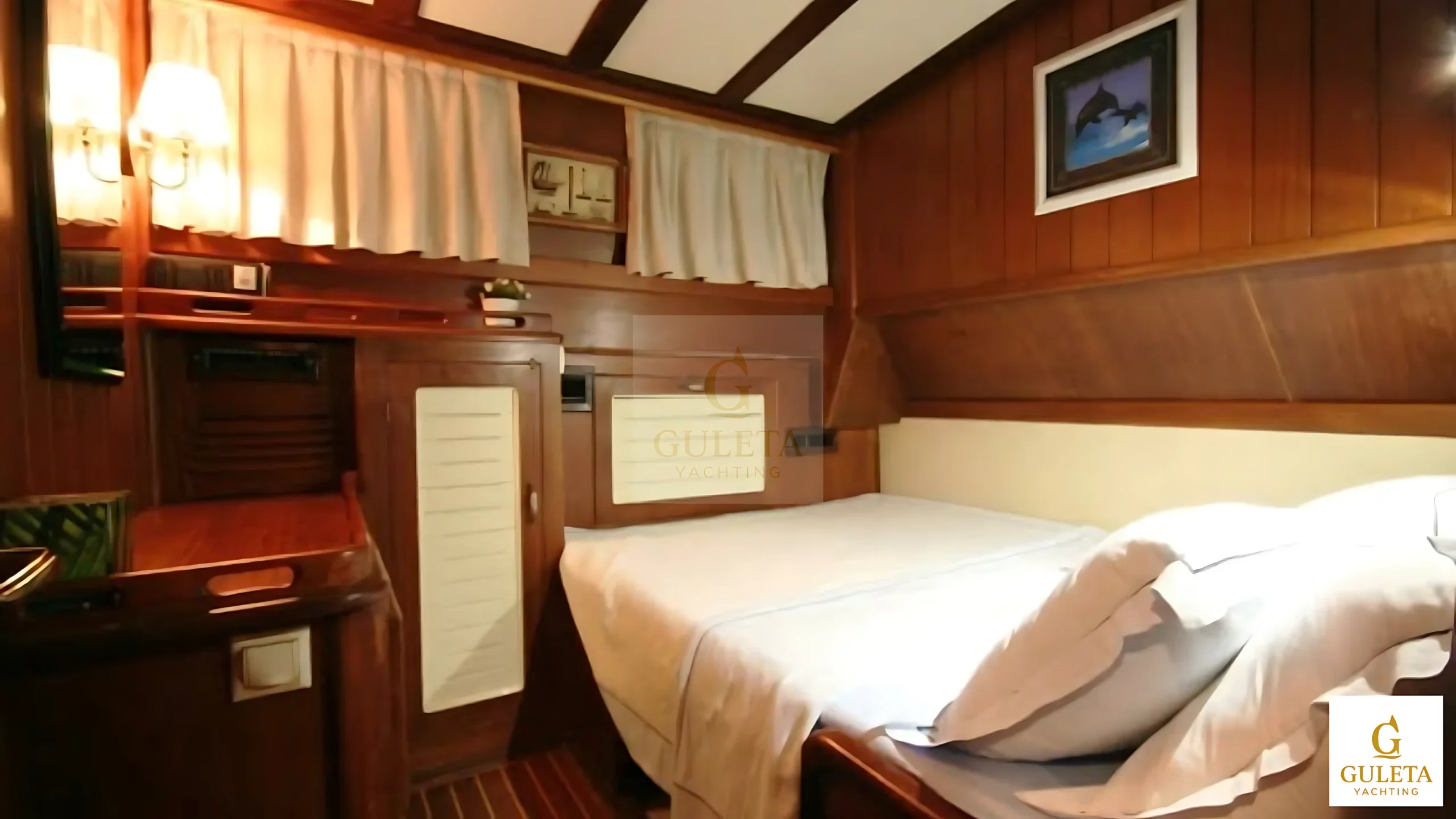 Stylish cabin interior on Kaptan Şevket Gulet yacht for luxury charter.