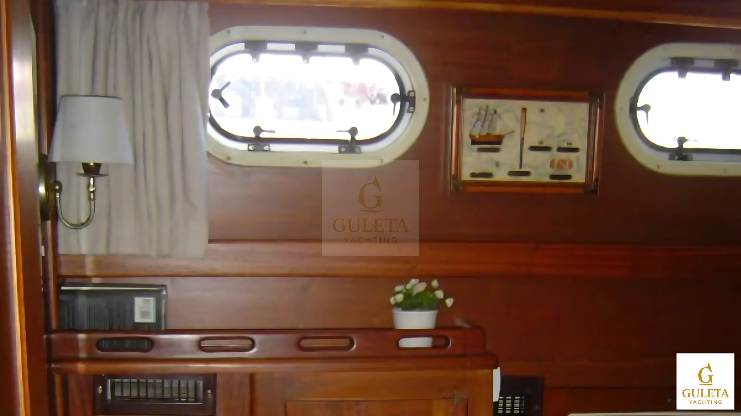 Interior view of Kaptan Şevket Gulet showcasing lounge and seating area.