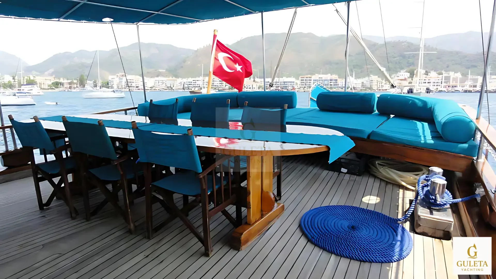 Aft deck dining table and seating area on Prenses Begüm Gulet